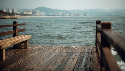 Coastal wooden pier with bench