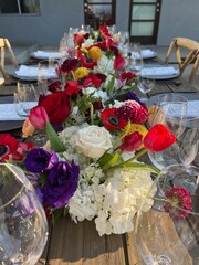 Vibrant Tablescape with Red, Purple, and White Flowers