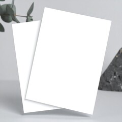 Two blank white sheets of paper