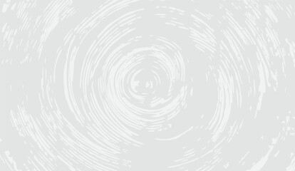 A textured abstract in soft gray tones showcases a concentric design, with swirling patterns creating depth and movement in a contemporary and visually engaging backdrop