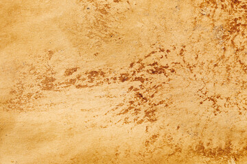 Grunge textured background. Brown stained surface with rough pattern. Abstract aged paper effect with rustic vintage look. Natural old material for design, scrapbooking or creative decorative project