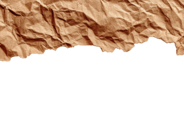 Crumpled brown kraft paper against black background