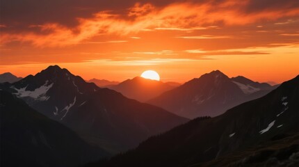 Sunrise over a mountain range, vibrant colors.  Silhouette peaks, snow-capped tops.  Blurred foreground