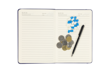 Medical cost concept. Pills and money on a notebook, for health insurance or treatment expenses isolated on white background with clipping path.