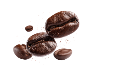 Coffee beans in motion against a dark background
