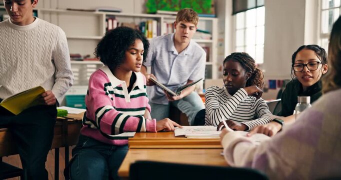 Group, classroom and students talking with project for collaboration, learning and education. High school, academy and teenagers in discussion for knowledge, assignment and lesson feedback for test