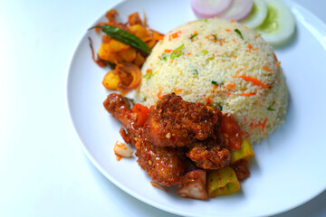 Restaurant Style Fried Rice with Devil Chicken and Fresh Garnishes.