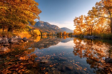 Obraz premium A serene crystal-clear autumn lake reflecting fiery fall foliage in the water.