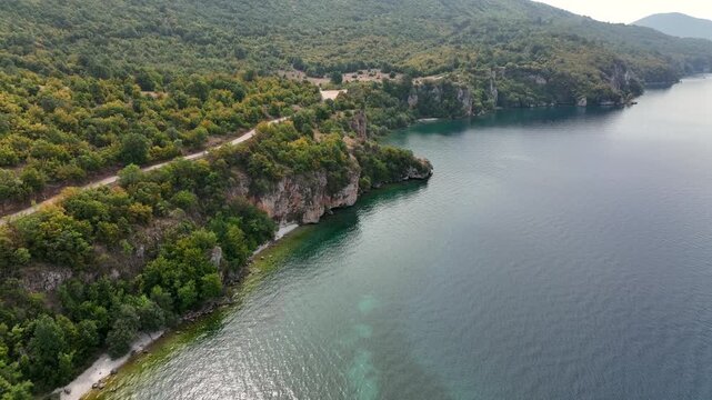 Aerial Scenic view on Wild Cliffy Coastline of Lake Ohrid in North Macedonia, the deepest and oldest lake in the Balkans