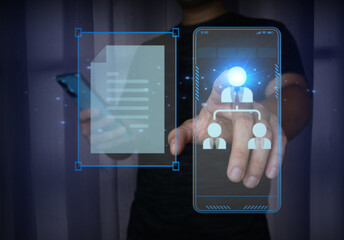 Businessman using smartphone with holographic interface for digital documents and team management