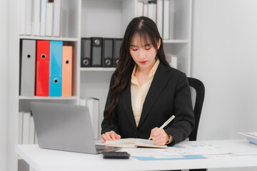 Asian Businesswoman Working at Desk