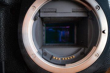 Close-up of a digital camera sensor with dust.
