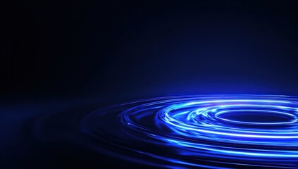 Abstract blue light rings on dark background