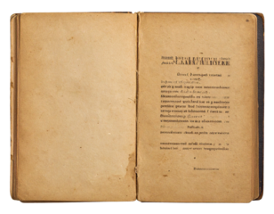 Vintage book with open pages and visible text, isolated on a white background, perfect for a historical or academic theme