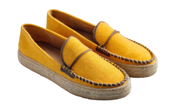 Pair of bright yellow loafers with a light beige platform sole.  Well-made, slip-on shoes with a stitched detail around the sole