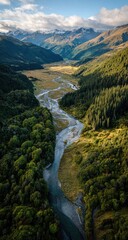 Aerial view of a winding river valley.  Mountainous landscape, lush forests, and a clear river meander through valleys.  Partly cloudy sky