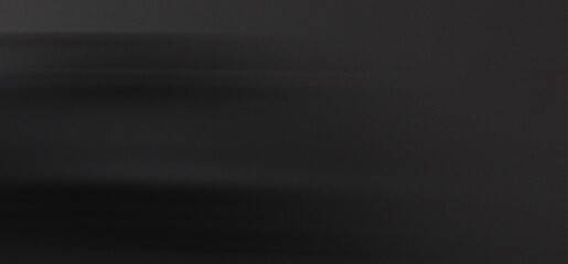 Dark Gray Textured Surface with Horizontal Streaks and Dark Shadow Areas image photo