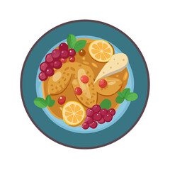 Chicken with sauce, grapes and lemon on a plate