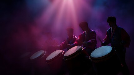Dynamic drummers perform traditional music on a smoky stage illuminated by vibrant purple and blue spotlights showcasing cultural ry and powerful