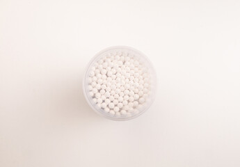 Cotton Buds Resting on White Background for Hygiene Concept