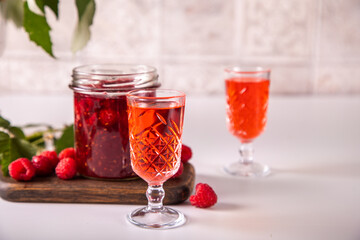 Raspberry alcohol liqueur drink on the table