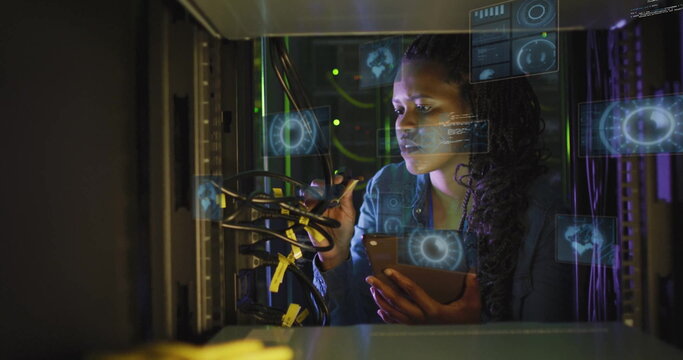 Holding smartphone, technician inspecting reconnecting cables in data center overlays, copy space