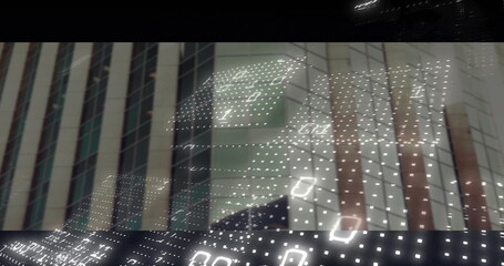 Displaying office facade in downtown, with glass panels reflecting skyline and binary code overlay