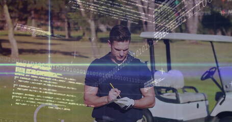 Golfer holding pencil and writing on notepad at fairway, in polo shirt with cart, code overlays