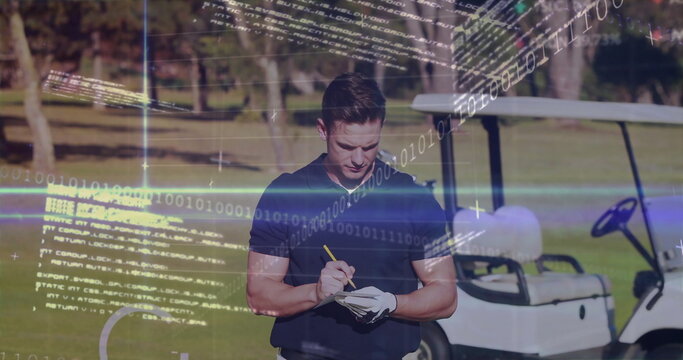 Golfer holding pencil and writing on notepad at fairway, in polo shirt with cart, code overlays