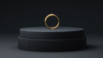 Gold ring on a dark pedestal