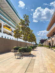 Modern cruise ship by the embankment with a walking area