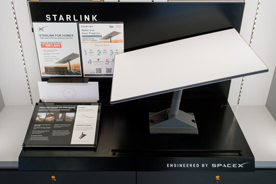 KUALA LUMPUR, MALAYSIA - AUG 17, 2025: SpaceX Starlink Standard Kit V4 satellite dish display in store.