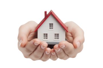 Miniature house held gently in cupped hands