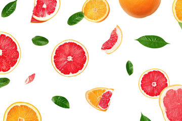 Citrus slices and leaves on black background