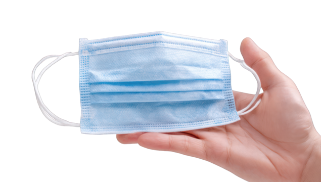 A light-blue disposable face mask held in a hand (1)