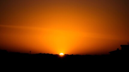 Sunrise with minimal horizon and space for text overlay.