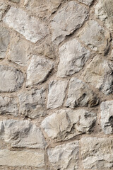Stone wall with rough natural texture.