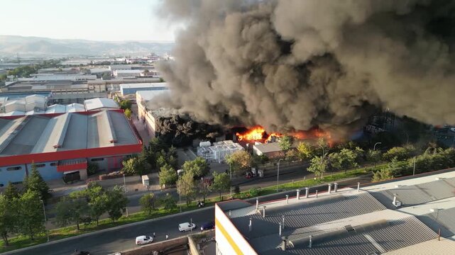 A very large factory manufacturer is putting out fires