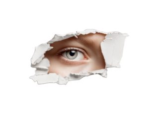 A woman's eye peeking through a torn hole in paper