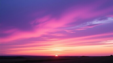 Obraz premium Vibrant sunset sky, soft colors, and hazy horizon