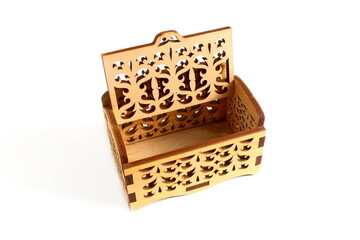 There is a decorative wooden box on a white background.