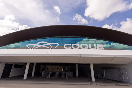 LUXEMBOURG, EUROPE - SEPTEMBER 1, 2025 -  Modern architecture of Coque arena with cloudy sky reflection in Luxembourg City, Luxembourg