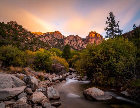 Mountain stream at autumn sunset