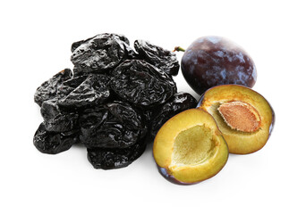 Dried prunes and fresh plums isolated on white