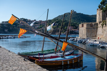 View of colourful Collioure, narrow streets and yellow, pink, orange houses, summer vacation...