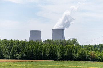 View on cooling towers of nuclear power plant thermal power station in which heat source is nuclear reactor, France, Europe, cheap energy source