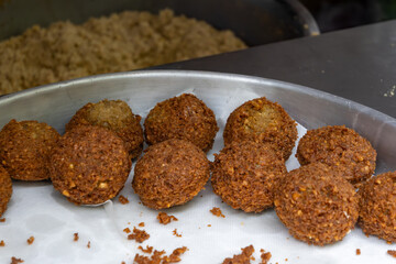 Deep fried vegetarian falafel nut dish balls on food market in Toulouse, France