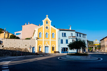 View of colourful Collioure, narrow streets and yellow, pink, orange houses, summer vacation...