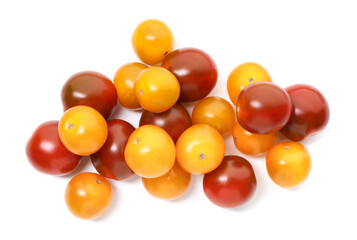 Heap of different ripe juicy tomatoes isolated on white, top view