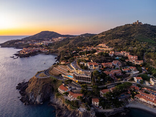 Early morning aerial view of colourful Collioure, narrow streets, summer vacation destination town...
